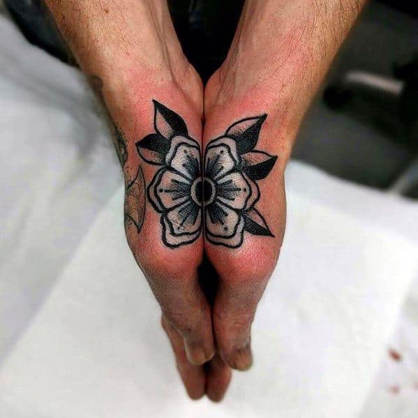 Gentleman With Simple Traditional Flower Hand Tattoo