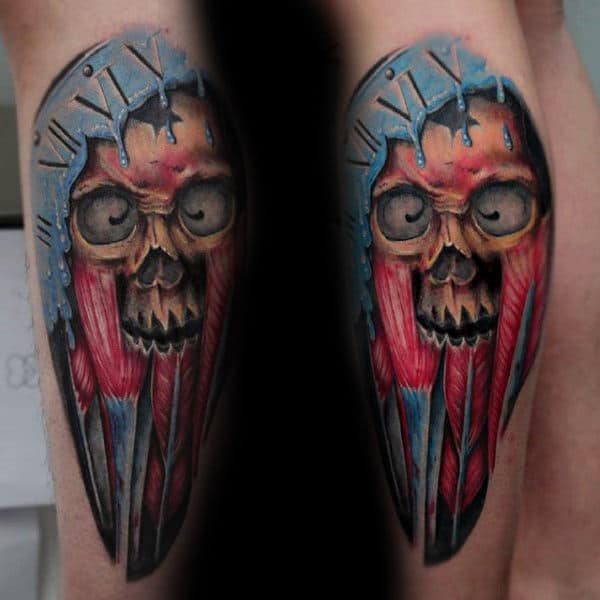 Gentleman With Skull And Muscle Leg Tattoo