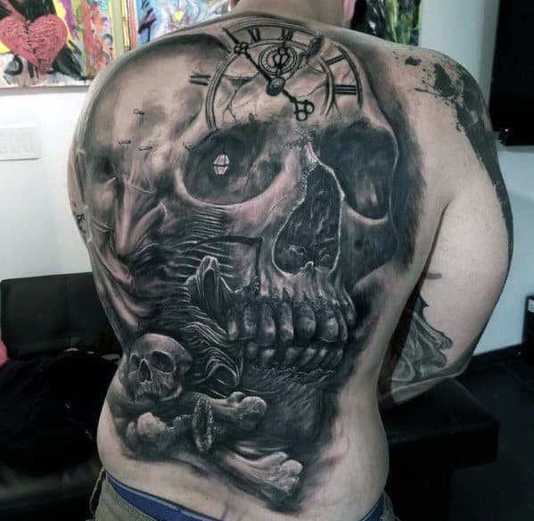 Dark skull back tattoo featuring melting textures, a clock symbolizing time, and bones beneath for a haunting, surreal look.