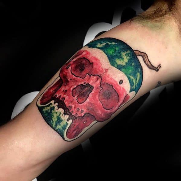 Gentleman With Skull Watermelon Tattoo On Inner Arm Bicep