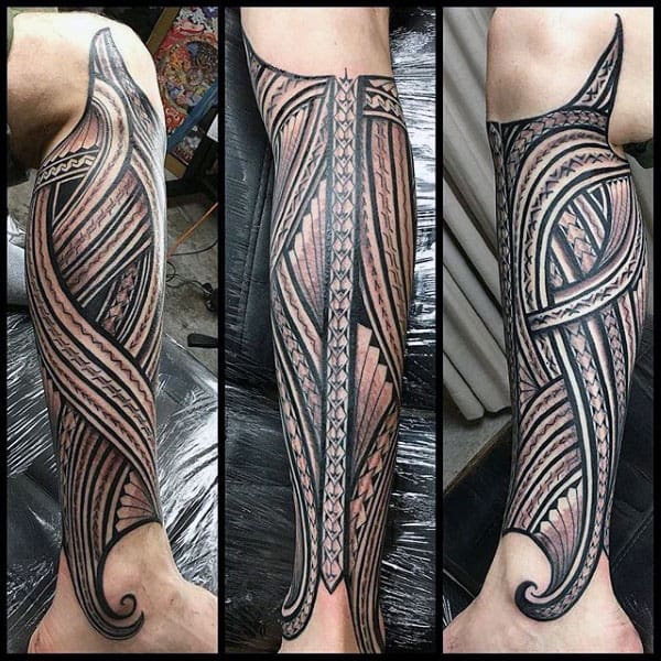 Gentleman With Sleeve Tribal Tattoos Leg
