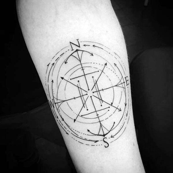 Abstract compass tattoo with fine-line geometric details and dynamic arrows, symbolizing movement, direction, and personal exploration.