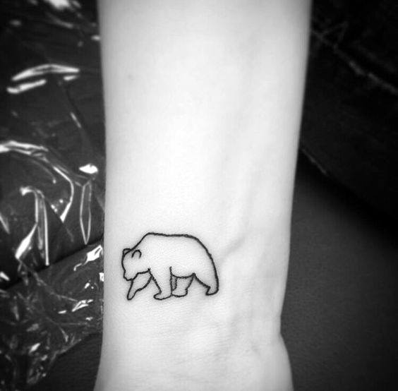 Gentleman With Small Simple Polar Bear Wrist Tattoo