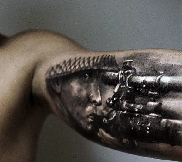 Gentleman With Solider Sniper Rifle Army Tattoo On Bicep