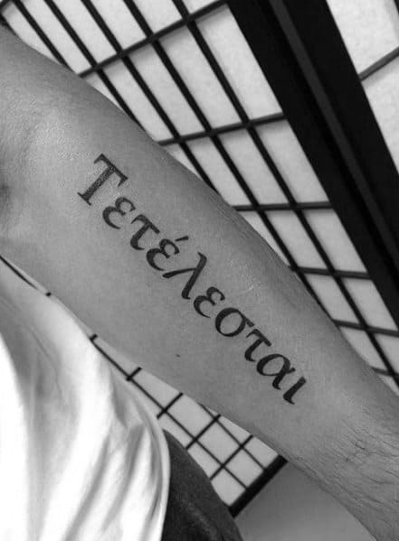 Gentleman With Tetelestai Forear Greek Lettering Tattoo