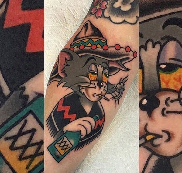 Bold cartoon-style tattoo of Tom in a sombrero smoking and holding a bottle, with vibrant colors and playful traditional design.