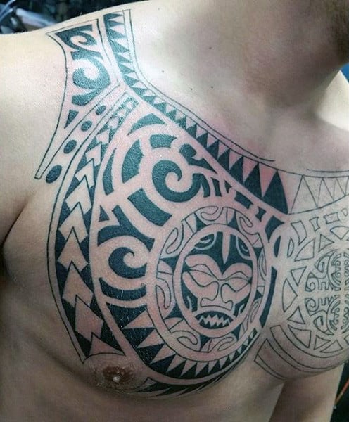 Gentleman With Tribal Chest Tattoo Designs