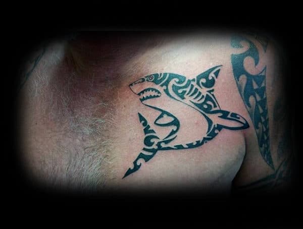 Gentleman With Tribal Shark Tattoo On Upper Chest