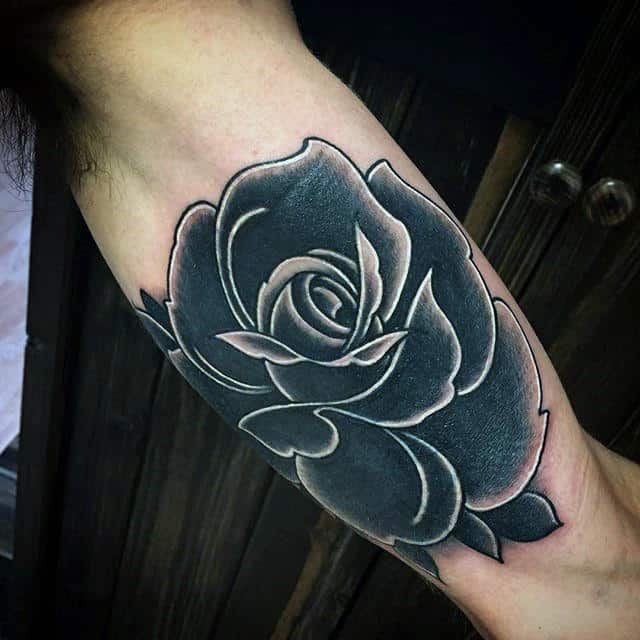 Gentleman With White And Black Ink Rose Tattoo On Inner Arm