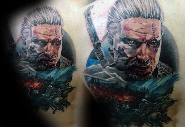 Colorful Witcher tattoo showing Geralt’s intense face above a battlefield scene with horses, fire, and mountains on a dramatic backdrop.