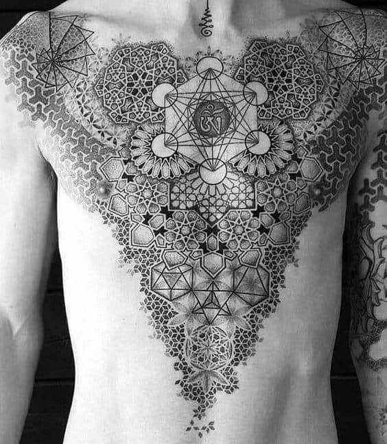 Large chest tattoo featuring Metatron’s Cube with an Om symbol at the center, surrounded by intricate sacred geometry and mandala patterns.