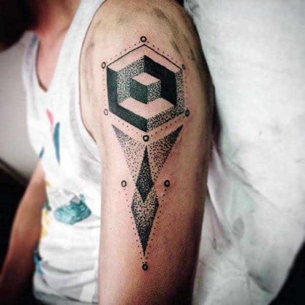 Geometric tattoo with cubes and triangles on a men's upper arm