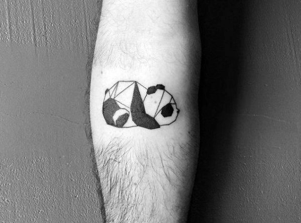 Minimalist geometric panda tattoo on the forearm, featuring a low-poly sleeping panda design with bold black accents.