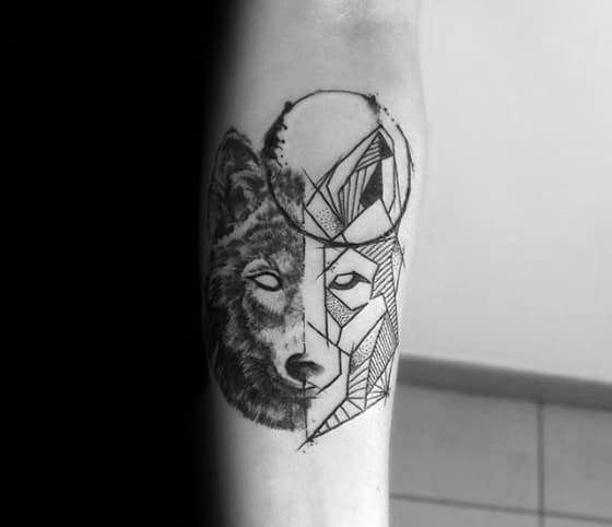 Half-realistic, half-geometric wolf tattoo on the forearm, with a sketched moon above blending nature and abstract styles.
