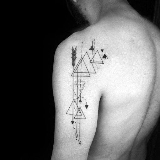Geometric arrow tattoo on the shoulder with layered triangles, dotted lines, and symbolic shapes for a bold and artistic composition.