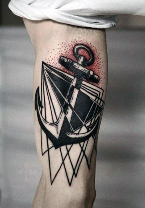 Geometric anchor tattoo in red and black on upper arm