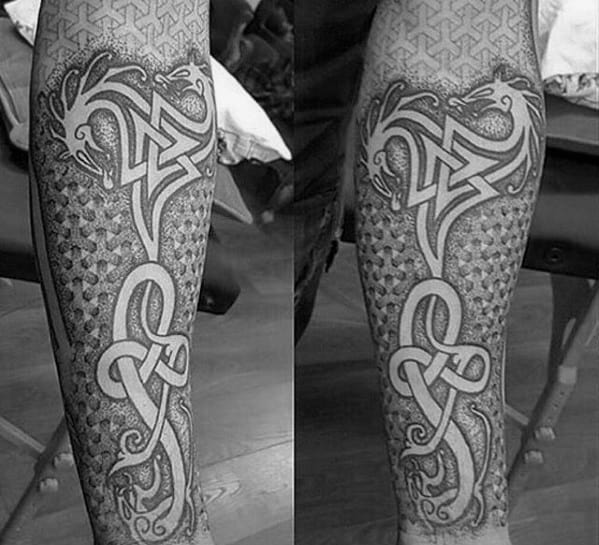 Geometric Negative Space Celtic Dragon Forearm Sleeve Tattoos For Men