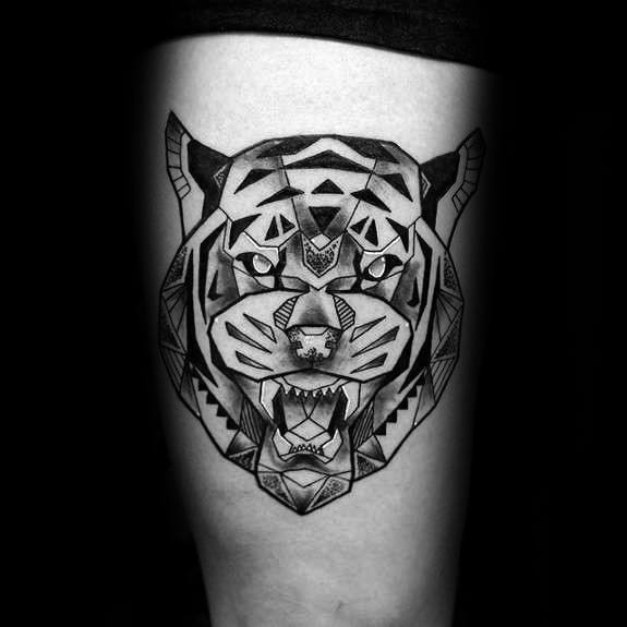 Roaring geometric tiger tattoo with bold black lines and angular patterns, placed on the thigh for a fierce and powerful look.