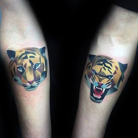 Matching geometric tiger tattoos on both arms, featuring bold polygonal shapes and vibrant color shading for calm and roaring expressions.