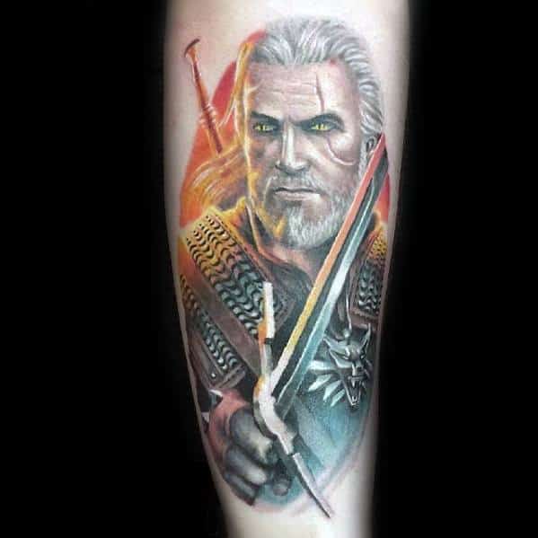 Geralt tattoo with glowing yellow eyes, silver hair, and detailed armor, holding a sword with a fiery red and blue aura behind him.