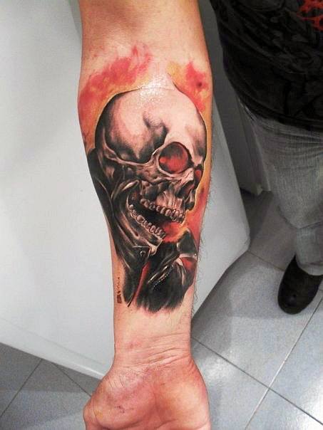 Realistic Ghost Rider forearm tattoo with a fiery skull, intense red background, and dark leather jacket for a bold, dramatic effect.