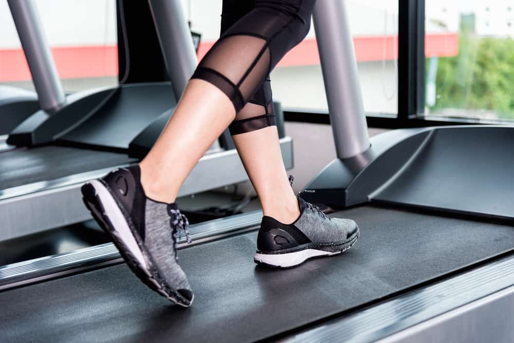 girl cardio running with black shoes