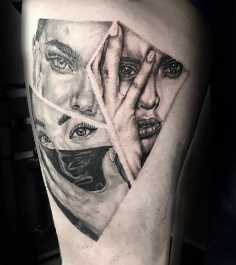 Tattoo of a fragmented face with hands and facial features in geometric shapes on a skin