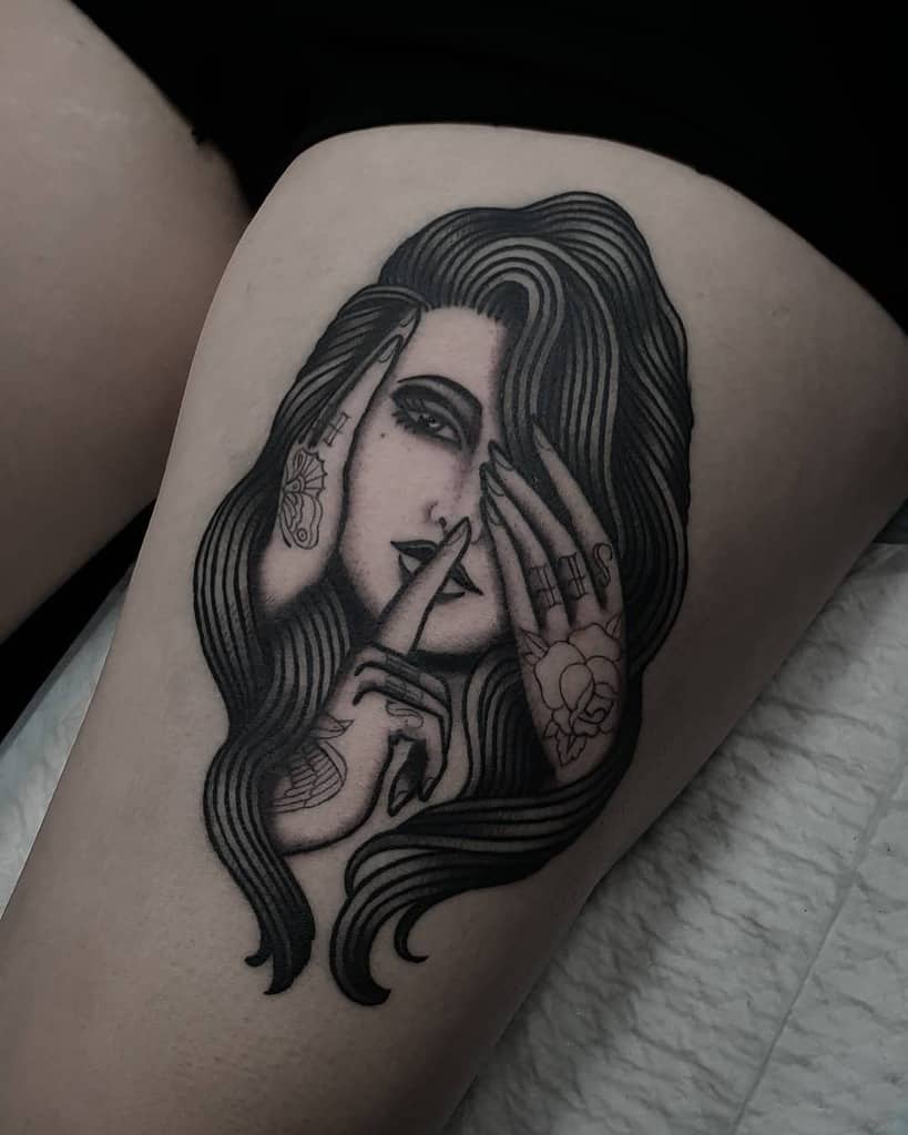 Blackwork tattoo of a woman with hands symbolizing 'Hear No Evil, See No Evil, Speak No Evil,' featuring bold lines and detailed shading