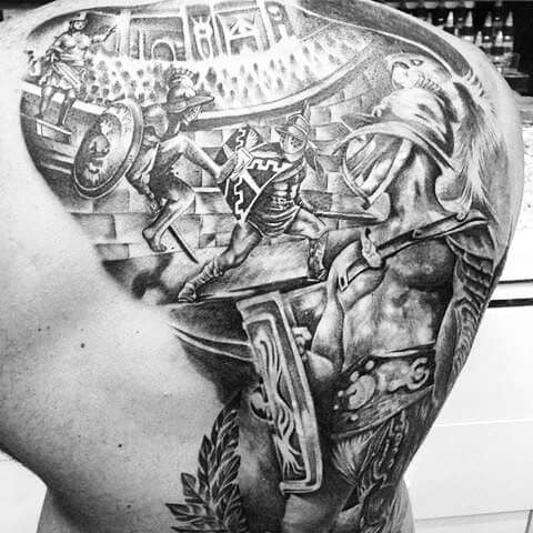 Tattoo of fierce gladiator combat in ancient Roman amphitheater on shoulder