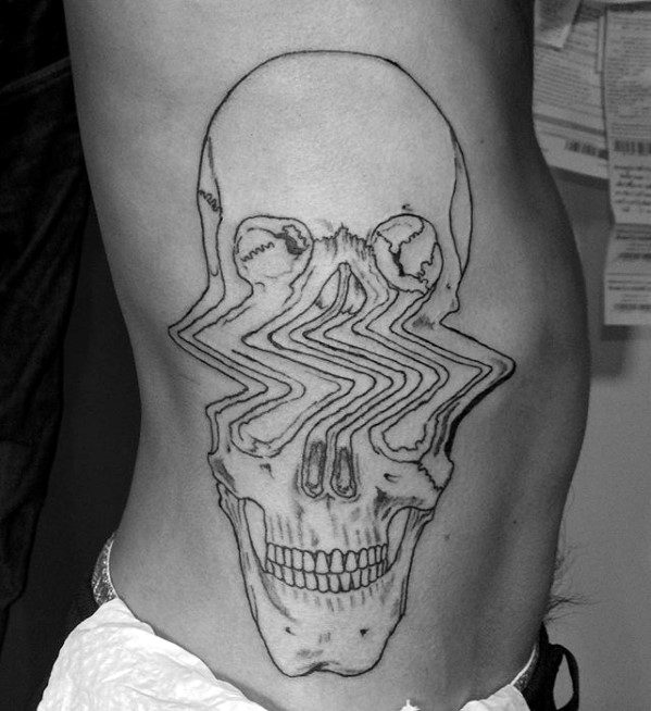 Minimalist glitch tattoo of a human skull with sharp horizontal wave distortions across the eye sockets and nasal area