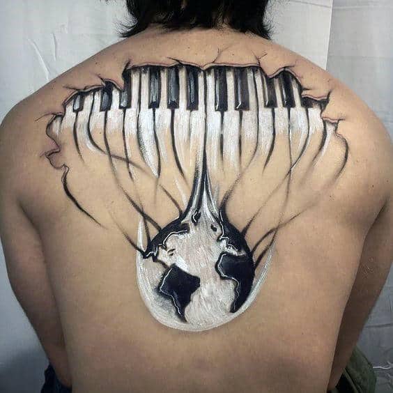 Globe With Piano Keys Mens White And Black Ink Bak Tattoo Designs