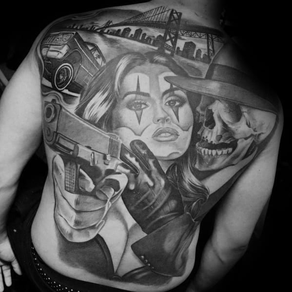 Detailed black and grey back tattoo featuring a woman with clown makeup aiming a Glock, a skull-faced figure, a car, and a city bridge in the background.