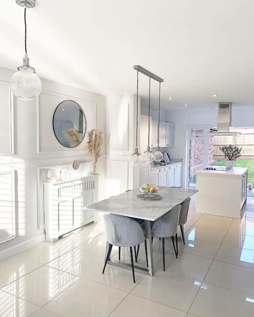large white gloss kitchen tiles marble dining table gray chairs