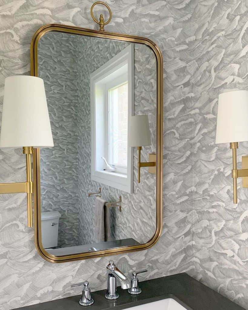 modern powder room with gold accents 