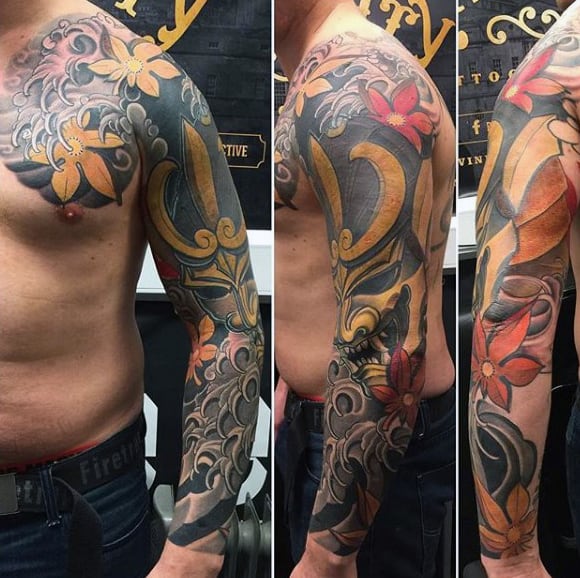 Golden Masked Figure Japanese Sleeve Tattoo For Guys