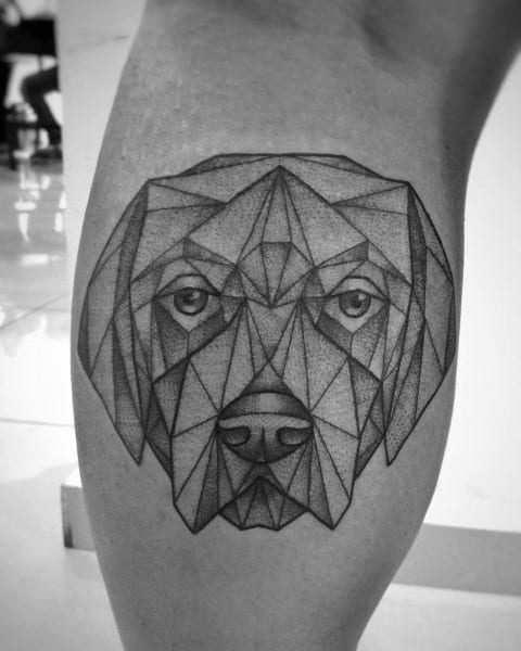 Geometric Golden Retriever tattoo on the leg, featuring a detailed low-poly design with precise linework for a modern and artistic look.