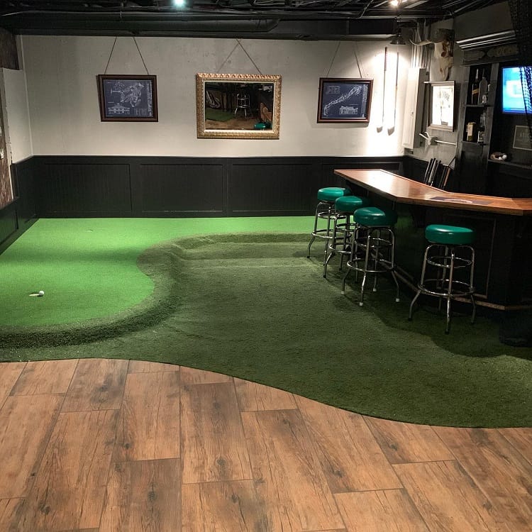 unique basement bar with putting green framed wall art green stools