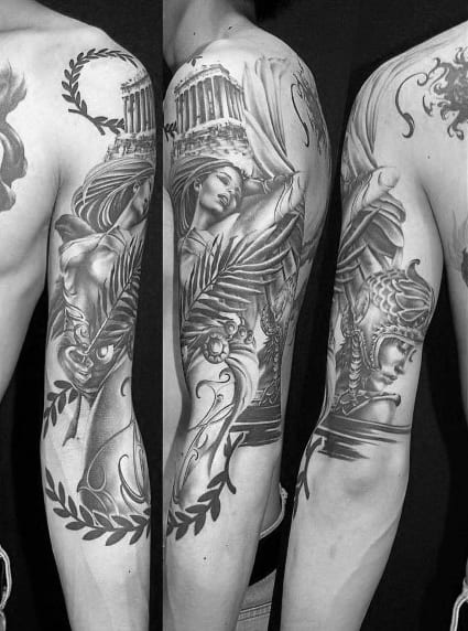 Full-sleeve Athena tattoo featuring temple ruins, laurel wreaths, winged elements, and helmeted goddess in dynamic black and grey realism