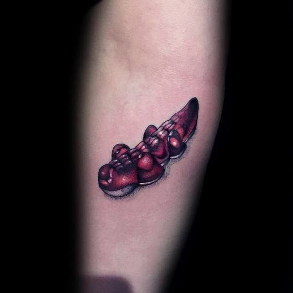 Realistic gummy candy tattoo with detailed shading and highlights, creating a lifelike 3D effect on the skin.