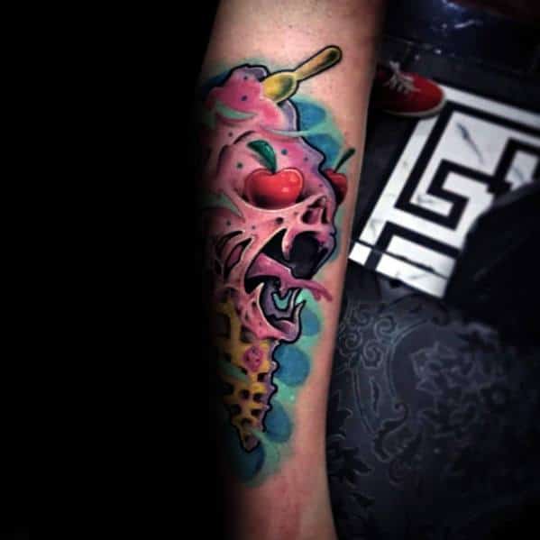 Vibrant tattoo of a melting skull ice cream cone with cherries for eyes, a spoon sticking out, and surreal dripping details in bold colors.