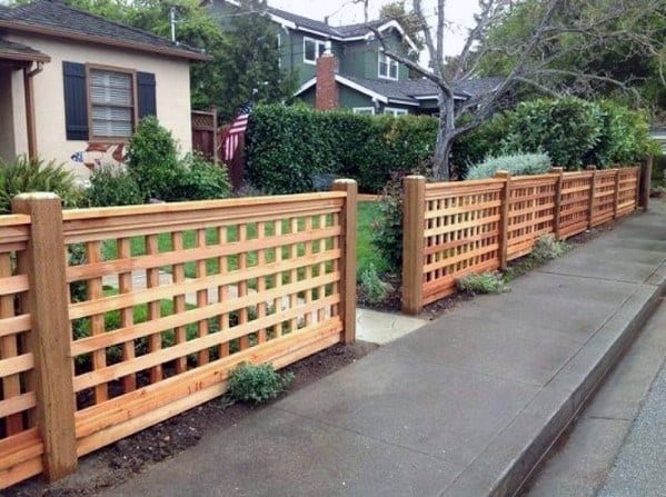 lattice work wood front yard fence 