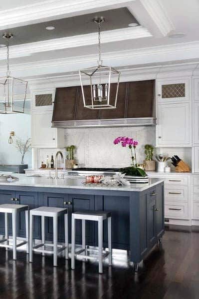 blue cabinet island in large country kitchen