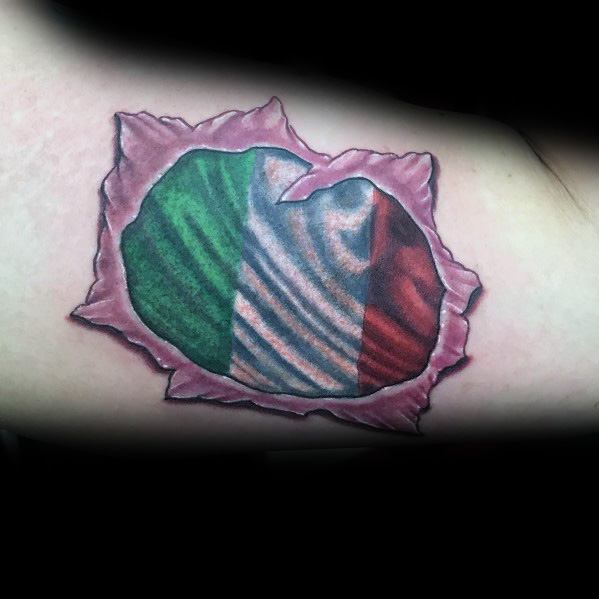Tattoo with a torn skin effect revealing the Italian flag underneath, symbolizing deep-rooted pride and connection to Italian heritage.