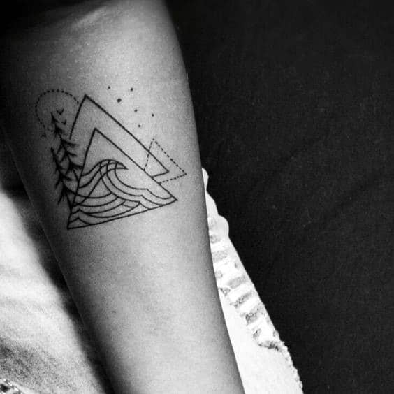 Minimalist black ink tattoo featuring a geometric mountain, flowing wave, and pine trees with fine lines and dotwork for a modern nature-inspired design.