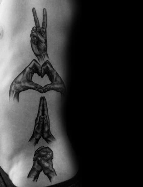 realistic black and grey tattoo of hands forming different symbolic gestures, vertically aligned along the ribcage with detailed shading
