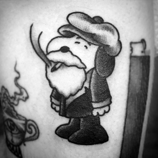 Black and white tattoo of Snoopy with a beard, wearing a fur hat and coat, smoking a pipe, giving him a rugged, old-fashioned look.