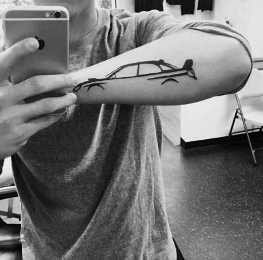 Minimalist Subaru rally car outline tattoo on the forearm, featuring a sleek and simple black line design capturing the car's iconic shape.
