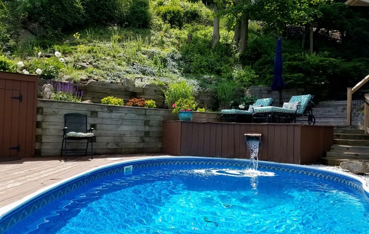 lodge style multilevel above ground pool deck