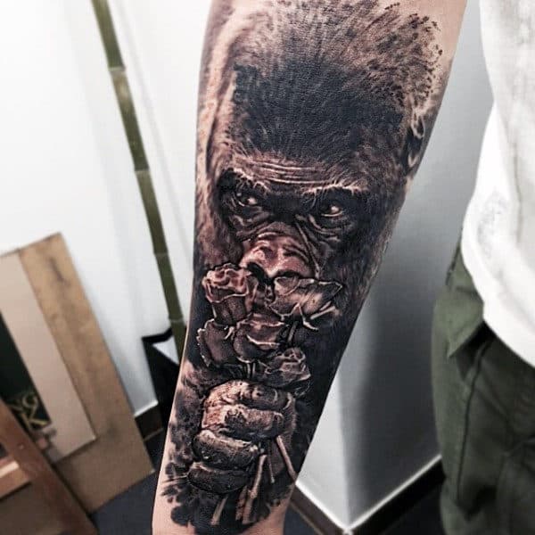 Gorilla Ape Tattoo Smelling Flowers Tattoo On Back Of Forearm For Men