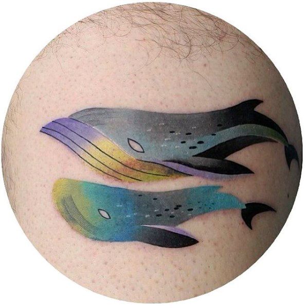 Minimalist gradient tattoo of two stylized whales in flowing motion, blending soft hues of blue, purple, yellow, and black.